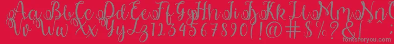 shabila Font – Gray Fonts on Red Background