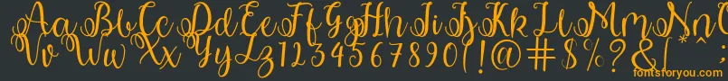 shabila Font – Orange Fonts on Black Background