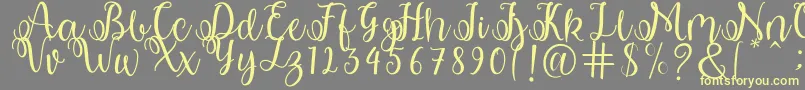 shabila Font – Yellow Fonts on Gray Background