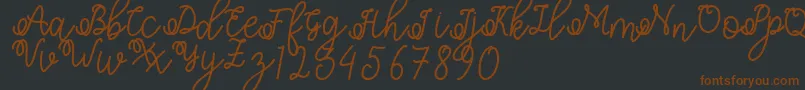 Shafiyyah Font – Brown Fonts on Black Background