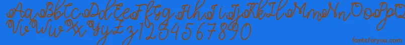Shafiyyah Font – Brown Fonts on Blue Background