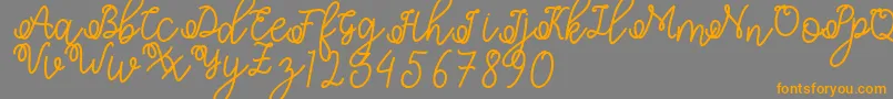 Shafiyyah Font – Orange Fonts on Gray Background