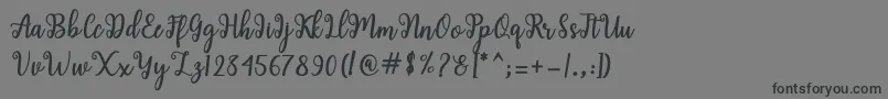 フォントShaila Script – 黒い文字の灰色の背景