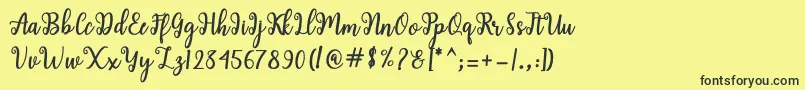 Fonte Shaila Script – fontes pretas em um fundo amarelo