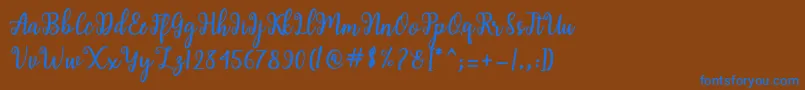 Shaila Script Font – Blue Fonts on Brown Background