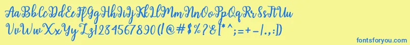 Shaila Script-fontti – siniset fontit keltaisella taustalla