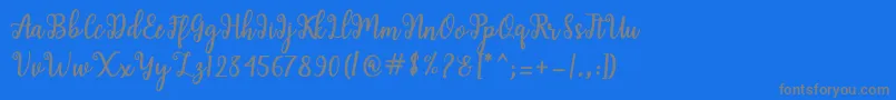 Shaila Script Font – Gray Fonts on Blue Background