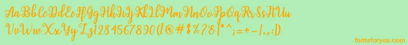 Shaila Script Font – Orange Fonts on Green Background