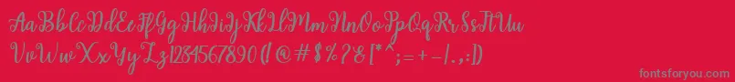 More about Shaila Script Font Shaila Script Font – Gray Fonts on Red Background