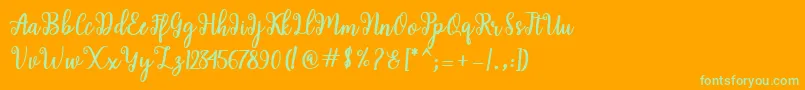 Shaila Script Font – Green Fonts on Orange Background