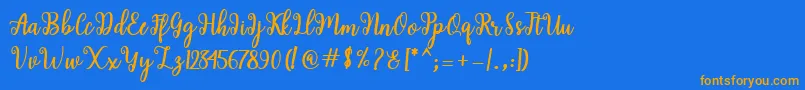 フォントShaila Script – オレンジ色の文字が青い背景にあります。