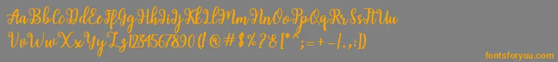 Weitere Informationen zur Shaila Script-Schriftart Shaila Script-Schriftart – Orangefarbene Schriften auf grauem Hintergrund