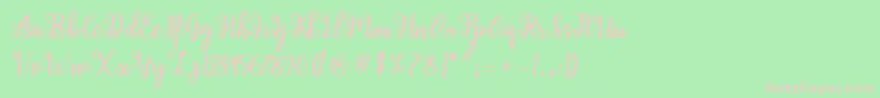 フォントShaila Script – 緑の背景にピンクのフォント