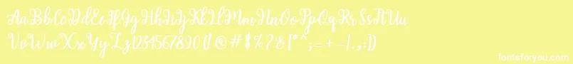 Шрифт Shaila Script – белые шрифты на жёлтом фоне