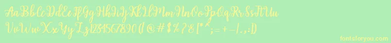 Shaila Script-fontti – keltaiset fontit vihreällä taustalla
