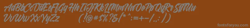 Czcionka Shanders free – szare czcionki na brązowym tle