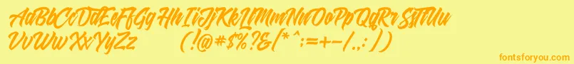 フォントShanders free – オレンジの文字が黄色の背景にあります。