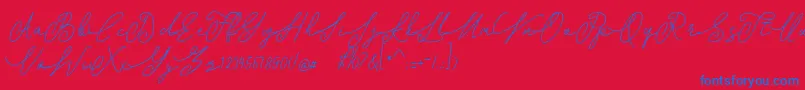 shangrela-Schriftart – Blaue Schriften auf rotem Hintergrund
