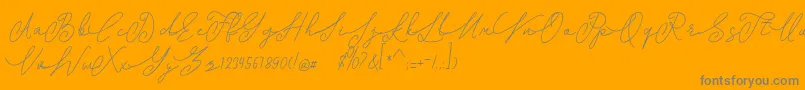 shangrela-Schriftart – Graue Schriften auf orangefarbenem Hintergrund