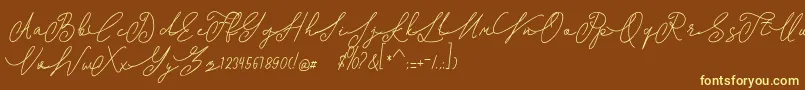 shangrela-fontti – keltaiset fontit ruskealla taustalla