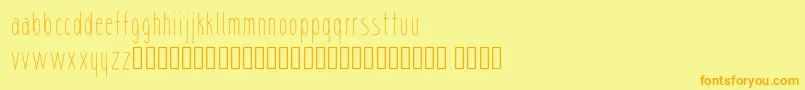 フォントsharik – オレンジの文字が黄色の背景にあります。