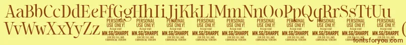 Шрифт SharpeLi PERSONAL – коричневые шрифты на жёлтом фоне