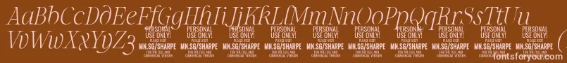 フォントSharpeThIt PERSONAL – 茶色の背景にピンクのフォント