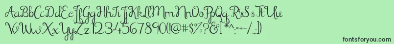 Shathika Font – Black Fonts on Green Background