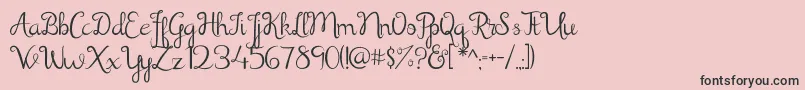 Shathika-Schriftart – Schwarze Schriften auf rosa Hintergrund