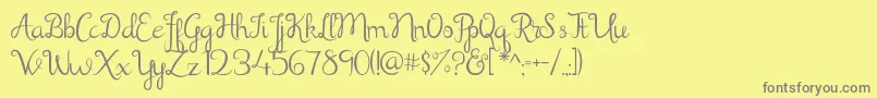 Shathika Font – Gray Fonts on Yellow Background