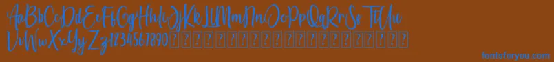 She Amasya Font – Blue Fonts on Brown Background