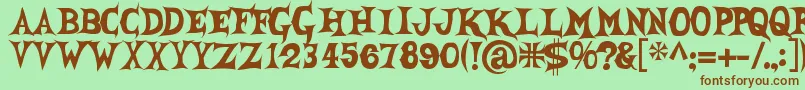 She Creature Font – Brown Fonts on Green Background