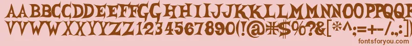 She Creature Font – Brown Fonts on Pink Background