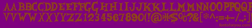 She Creature Font – Brown Fonts on Purple Background