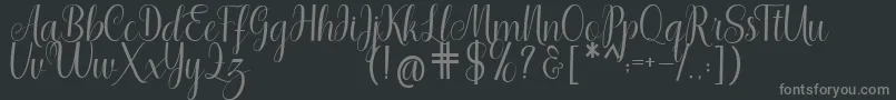 Shedaytia-Schriftart – Graue Schriften auf schwarzem Hintergrund