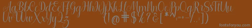 Weitere Informationen zur Shedaytia-Schriftart Shedaytia-Schriftart – Graue Schriften auf braunem Hintergrund