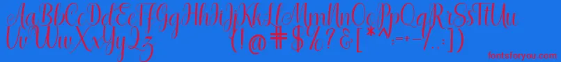 Shedaytia Font – Red Fonts on Blue Background
