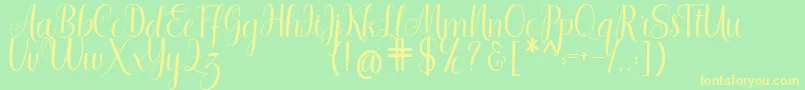 Shedaytia Font – Yellow Fonts on Green Background