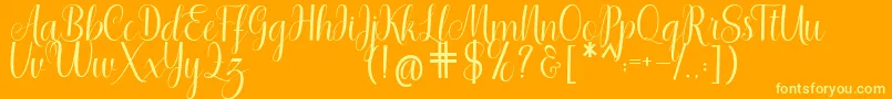 Shedaytia Font – Yellow Fonts on Orange Background