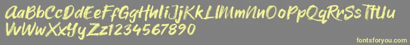 Sheila Crayon Font – Yellow Fonts on Gray Background