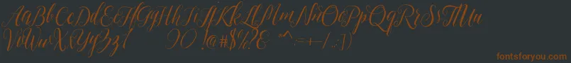Sheilova-fontti – ruskeat fontit mustalla taustalla