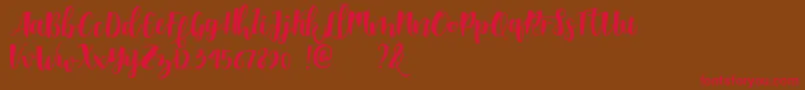 Shella clean dafont Font – Red Fonts on Brown Background