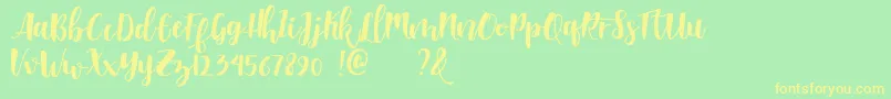 Shella clean dafont-Schriftart – Gelbe Schriften auf grünem Hintergrund