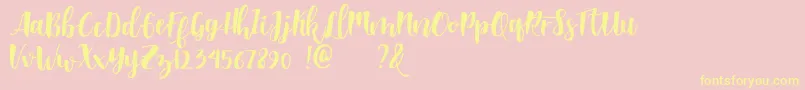 Shella clean dafont Font – Yellow Fonts on Pink Background