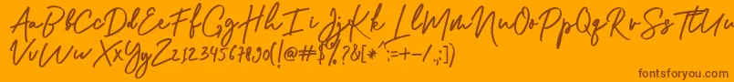 Shellia Font – Brown Fonts on Orange Background