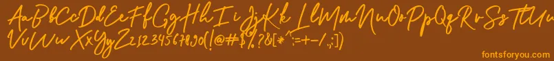 Shellia Font – Orange Fonts on Brown Background