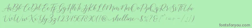 shelline-Schriftart – Graue Schriften auf grünem Hintergrund