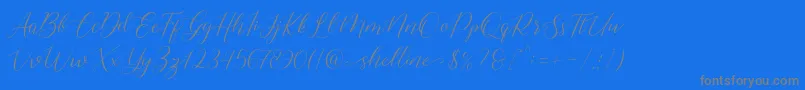 フォントshelline – 青い背景に灰色の文字