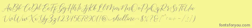 shelline-Schriftart – Graue Schriften auf gelbem Hintergrund