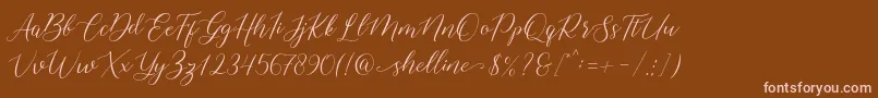 shelline-Schriftart – Rosa Schriften auf braunem Hintergrund